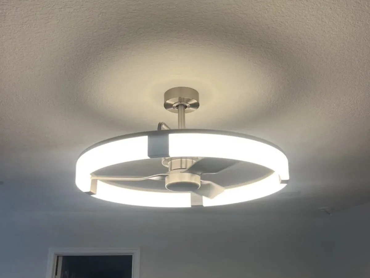 Modern LED ring ceiling fan installed and lit in a Georgetown, TX home